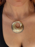 Large mother of pearl pendant on a waterproof stainless steel wire necklace.